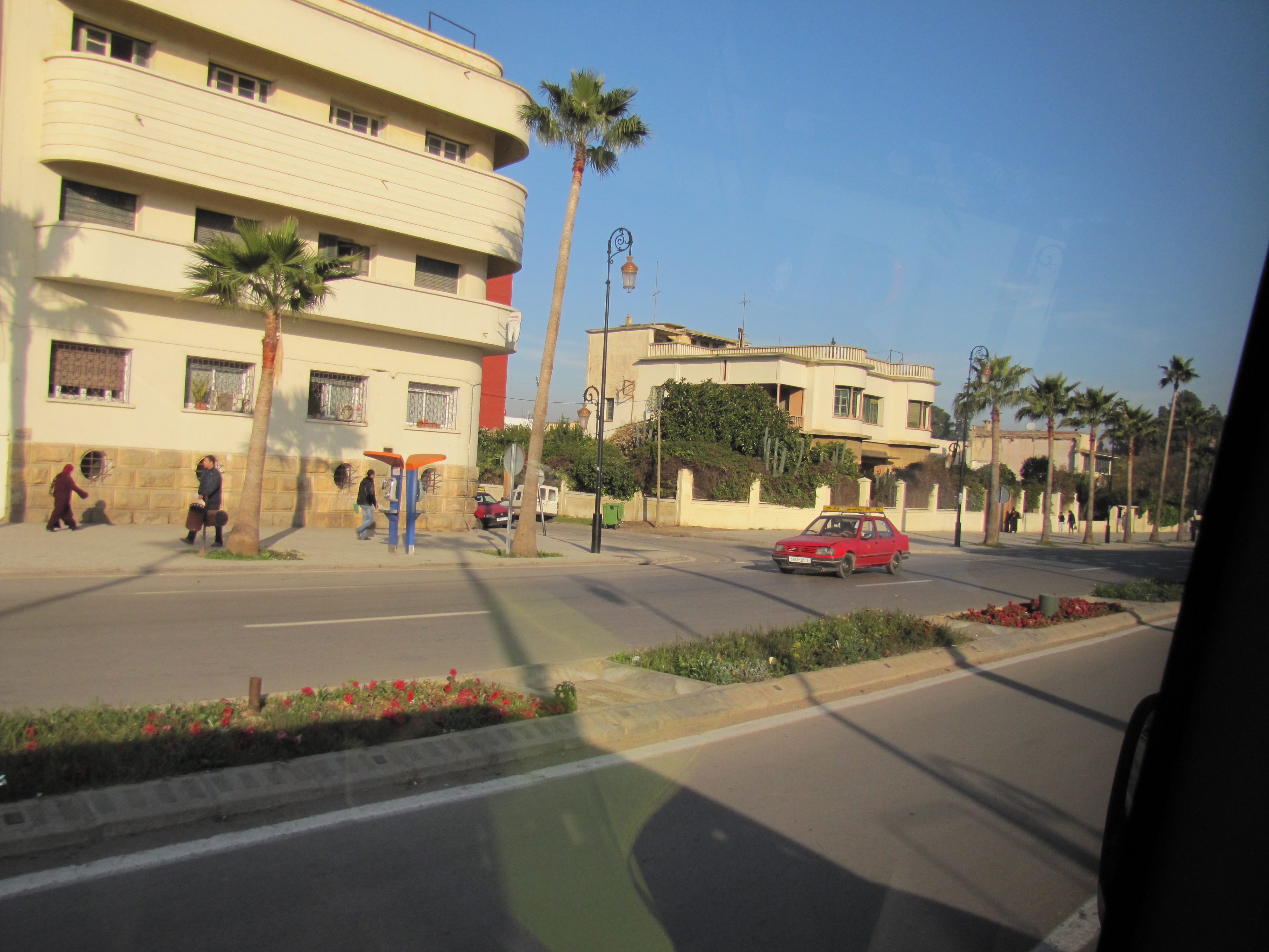 Petit Taxi and street scene in Fes, Morocco - Trevor's Travels